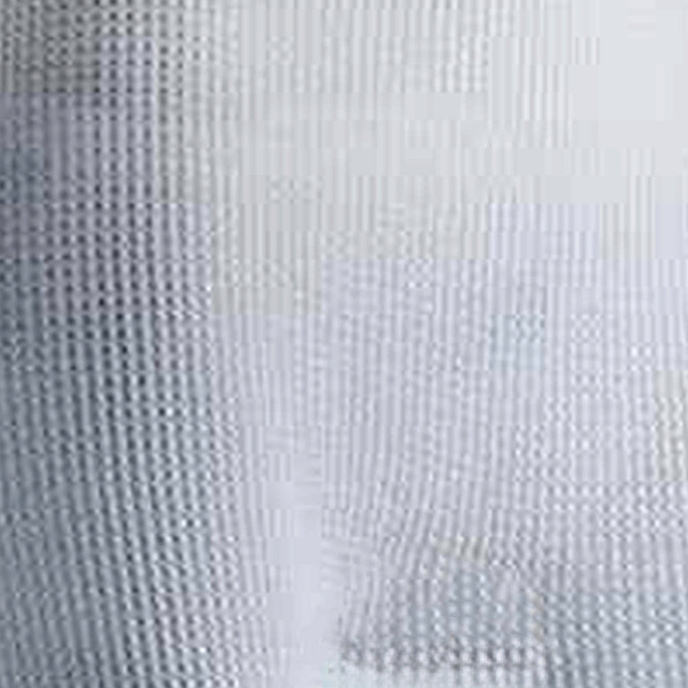 Close-up of a handcrafted, cotton-rich circular waffle knit fabric designed for comfort and warmth, ideal for layering in Health & Wellness and Clothing and Accessories collections.