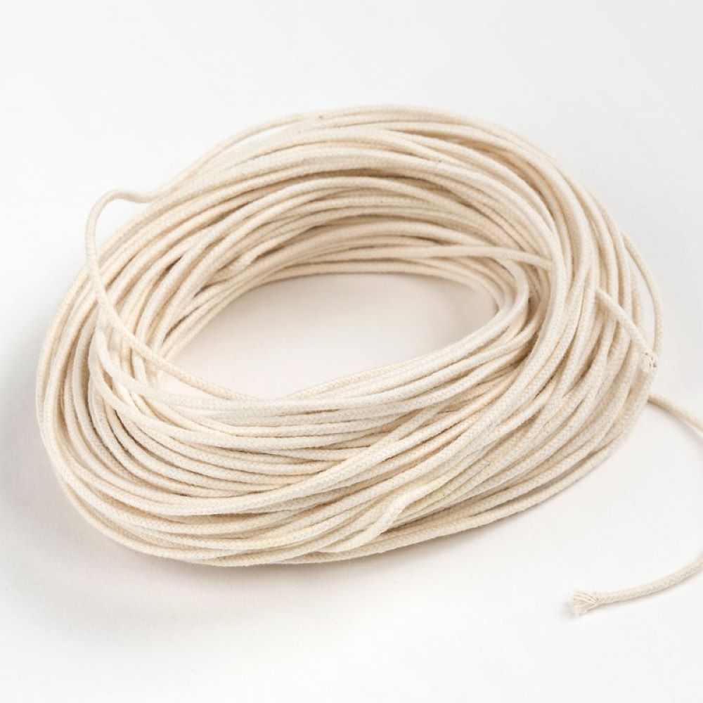 Natural cotton medium paper core wick coiled for container candles 2 to 4 inches in diameter, ideal for clean burning in Lamps & Lighting and Candlemaking Supplies collections.