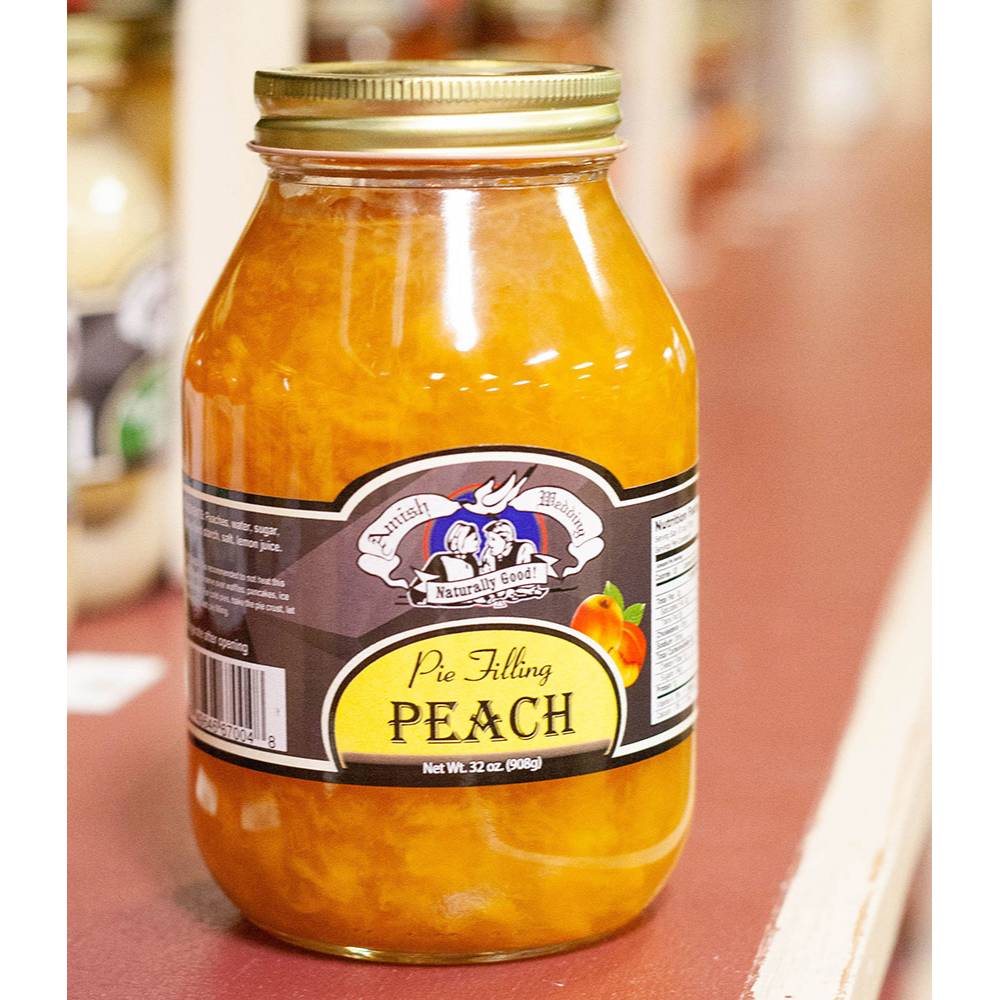 Handcrafted jar of Amish-made peach pie filling with real fruit, free from corn syrup and artificial coloring, part of Kitchen & Food, Food, Pantry, USA Made, Best Sellers, and Promo Eligible collections.
