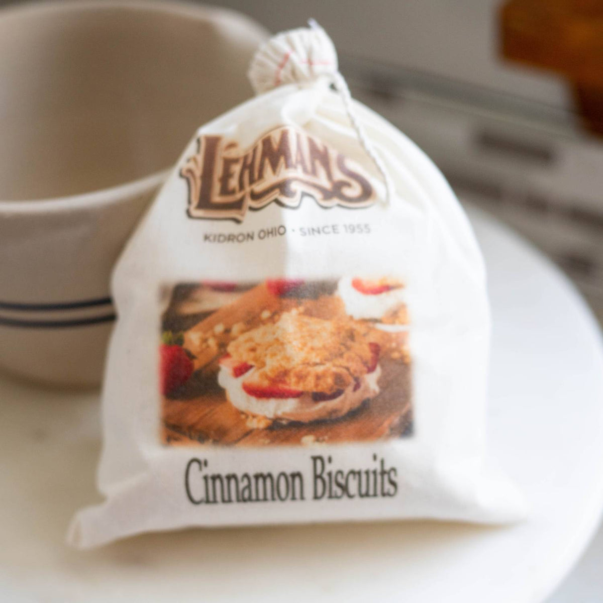 Handcrafted natural cotton bag of Lehman's exclusive cinnamon biscuit mix featuring vintage logo and rustic image, perfect for Kitchen & Food, Pantry, Dry Goods, and Best Sellers collections.