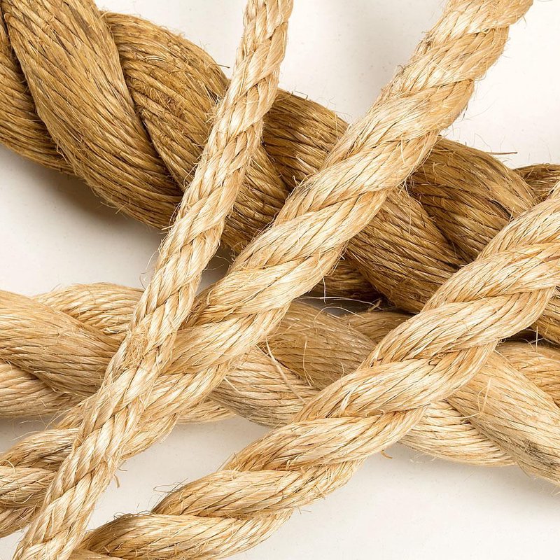 Close-up of natural fiber ropes made from soft, strong abaca strands, showcasing handcrafted quality and durability suitable for farm, garden, and tool use.