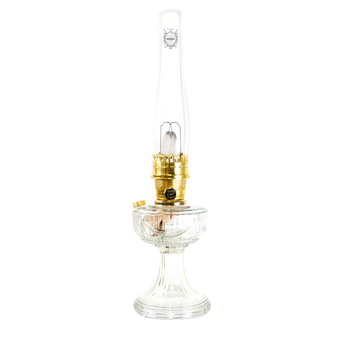 Handcrafted clear glass oil lamp with polished brass burner and tall chimney, featuring a classic design, part of Lamps & Lighting, Oil Lamps, Table Lamps, Best Sellers, and Promo Eligible collections.