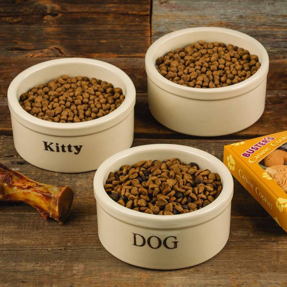 Set of handcrafted small stoneware bowls in natural stone color with glossy lead-free glaze, labeled "Dog" and "Kitty," filled with kibble, ideal for Home & Decor, Pet Supplies, USA Made, Best Sellers, and Promo Eligible collections.
