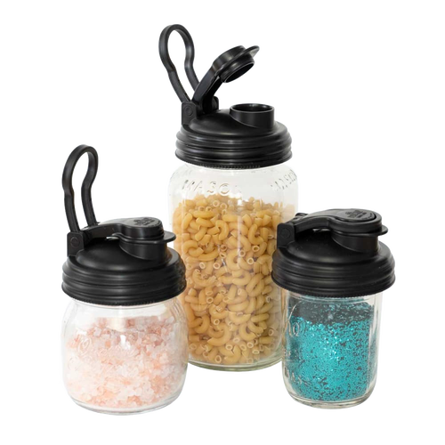 Three clear regular-mouth jars filled with pink salt, pasta, and blue granules, each topped with a black pour lid featuring a flip-top spout and carry loop, made in the USA, ideal for Kitchen & Food, Dinnerware, Kitchen Gadgets, Kitchen Accessories, USA Made, Best Sellers, and Promo Eligible collections.