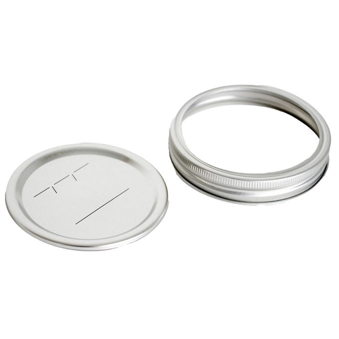 Wide-mouth metal lid and matching silver screw band with BPA-free sealing compound, ideal for Kitchen & Food, Food Preservation, Canning, Canning Jar Lids and Bands, and Best Sellers collections.