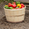 Handcrafted Old-Time poplar bushel basket made in USA from untreated wood with metal wire, filled with colorful bell peppers, ideal for Farm, Garden & Tool and Best Sellers collections.