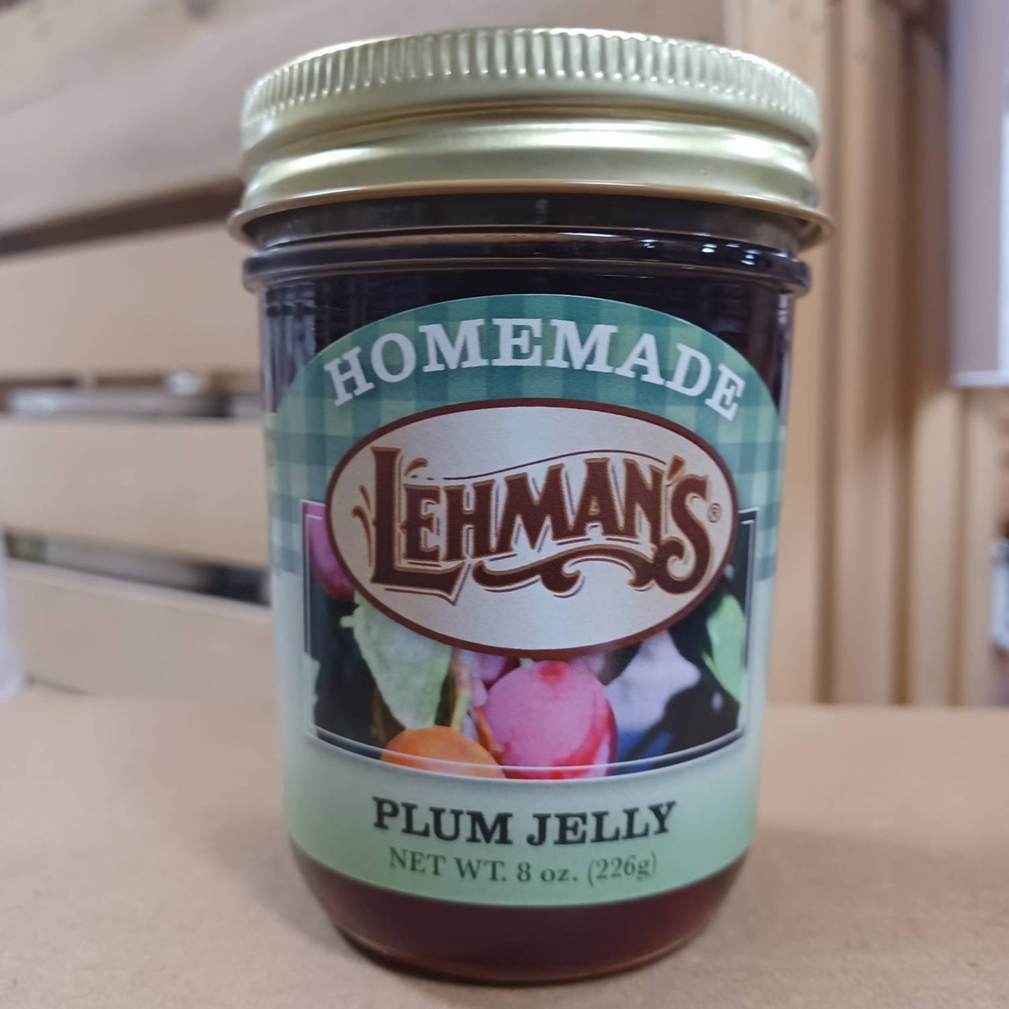 Handcrafted plum jelly in an 8 oz jar made with all-natural ingredients, Amish made in USA, perfect for Kitchen & Food, Pantry, and Peanut Butter & Jellies collections.