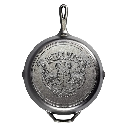 Bottom view of a handcrafted cast iron skillet with an embossed steer skull and rope design, made in USA, ideal for Kitchen & Food, Cookware, Cast Iron, USA Made, and Best Sellers collections.