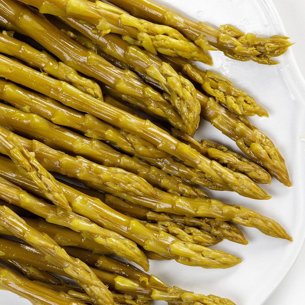 Close-up of handcrafted pickled asparagus spears with tangy flavor, showcasing Amish-made quality, perfect for Kitchen & Food, Food, Pantry, USA Made, Best Sellers, and Promo Eligible collections.
