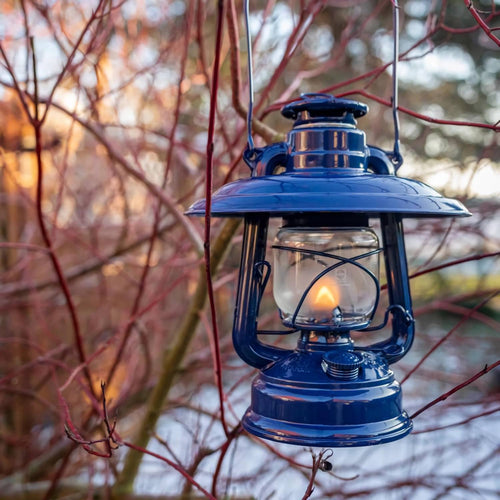 Handcrafted deep blue steel reflector shade directing lamp light downward to minimize glare, protecting glass globe, featured in Lamps & Lighting, Emergency Supplies, Oil Lamps, Best Sellers, and Promo Eligible collections.