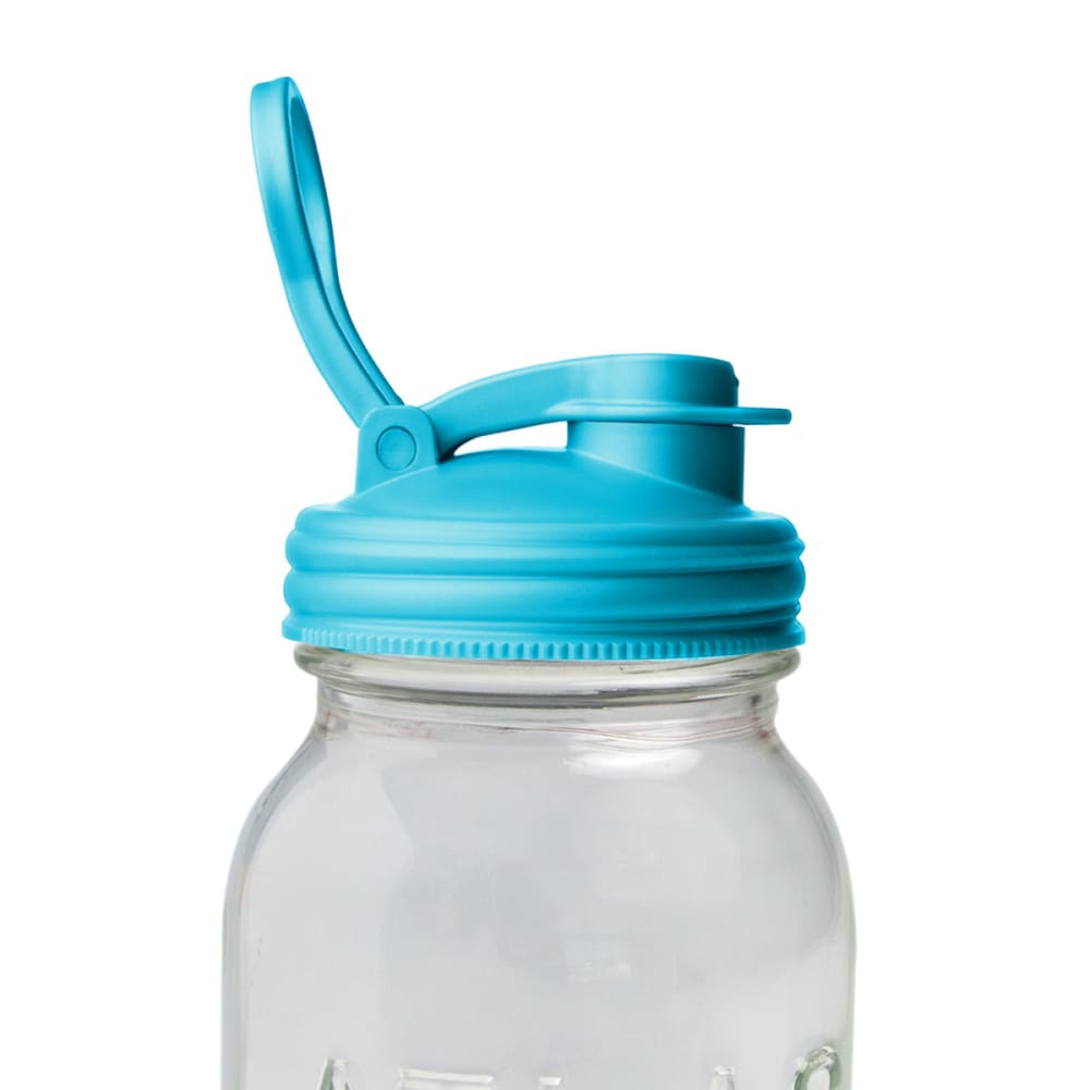 Close-up of a clear glass jar fitted with a bright blue pour lid featuring a flip-top spout and a carry loop, designed for regular-mouth jars, ideal for Kitchen & Food and USA Made collections.