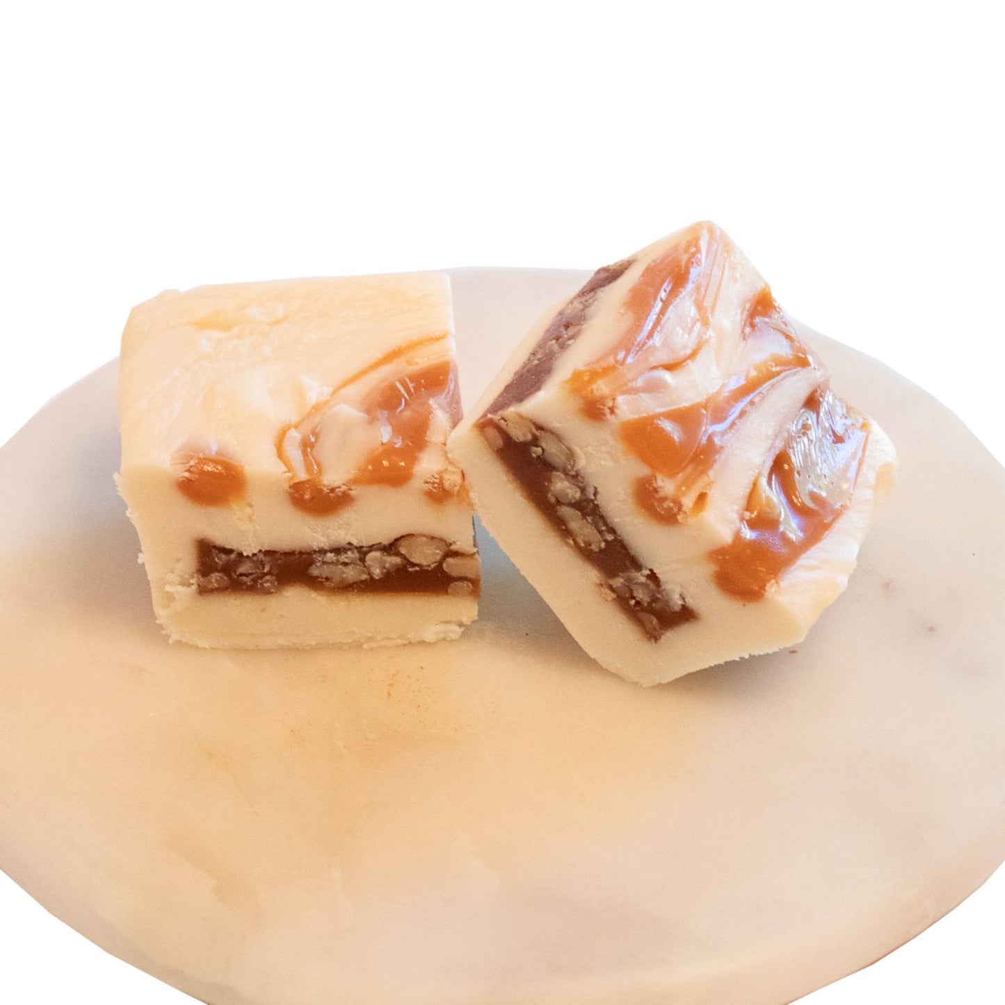 Two handcrafted creamy fudge squares layered with rich chocolate and swirled caramel, featuring a smooth, melt-in-your-mouth texture, from Kitchen & Food, Snacks and Sweets, USA Made, Best Sellers, Promo Eligible collections.