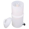 White plastic water filter housing with cylindrical replacement elements inside and a removable lid, designed for tabletop use in emergency and water treatment applications.