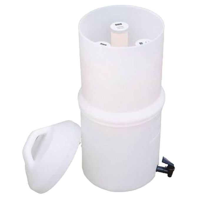 White plastic water filter housing with cylindrical replacement elements inside and a removable lid, designed for tabletop use in emergency and water treatment applications.