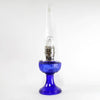 Unique handcrafted cobalt oil lamp with Lincoln drape font design, featuring brass burner and tall clear chimney, ideal for Lamps & Lighting, Oil Lamps, Table Lamps, Best Sellers, and Promo Eligible collections.