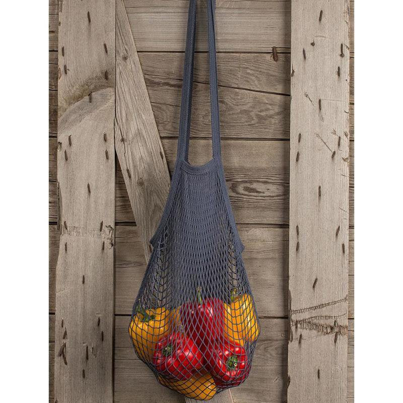Dark gray natural cotton reusable string bag with shoulder handles, holding fresh yellow and red bell peppers, perfect for Kitchen & Food, Storage and Serving, Best Sellers, and Promo Eligible collections.