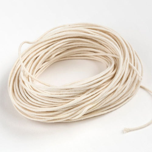 Natural cotton medium paper core wick coiled for container candles 2 to 4 inches in diameter, ideal for clean burning in Lamps & Lighting and Candlemaking Supplies collections.