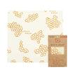 Handmade large beeswax food wrap with honeycomb pattern in orange on cream-colored muslin, eco-friendly and made in USA, ideal for Kitchen & Food and Storage collections.