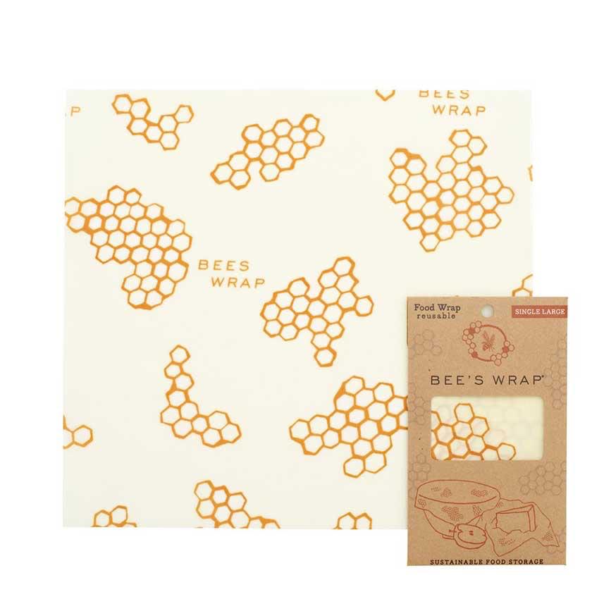 Handmade large beeswax food wrap with honeycomb pattern in orange on cream-colored muslin, eco-friendly and made in USA, ideal for Kitchen & Food and Storage collections.