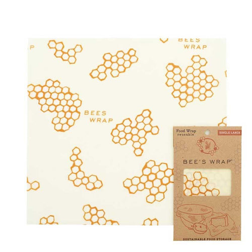 Handmade large beeswax food wrap with honeycomb pattern in orange on cream-colored muslin, eco-friendly and made in USA, ideal for Kitchen & Food and Storage collections.