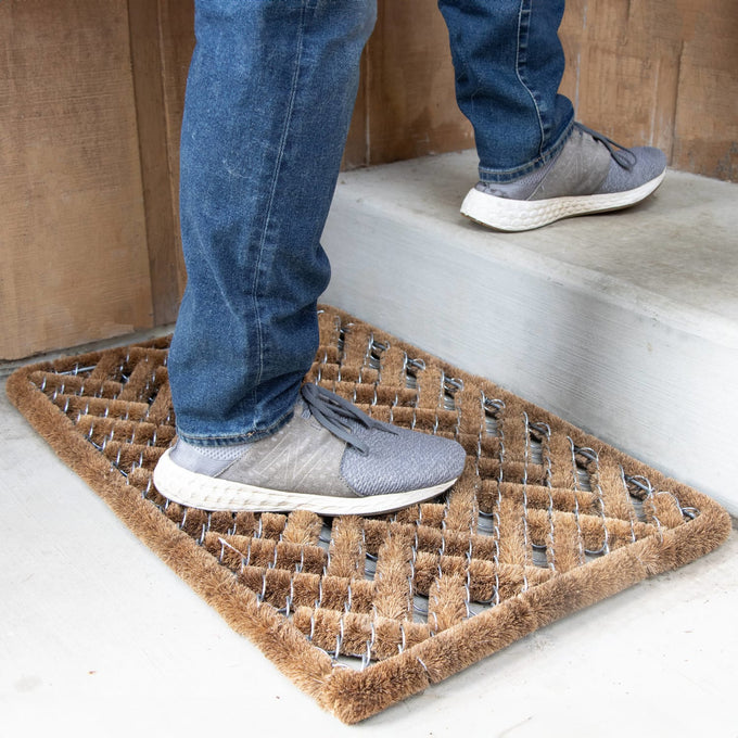 Handcrafted bootscraper rug featuring natural coconut fiber bristles woven into wire brushes, designed for removing dirt from shoes, part of Home & Decor, Home Textiles, Best Sellers, and Promo Eligible collections.