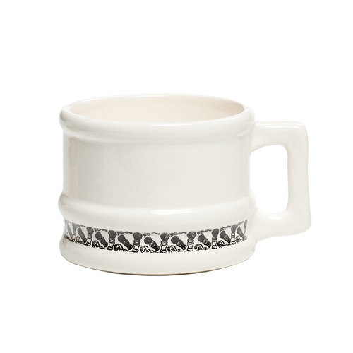 White porcelain shaving mug with black decorative border and sturdy handle, designed for long-lasting use with large soaps, featured in Health & Wellness and Grooming collections.