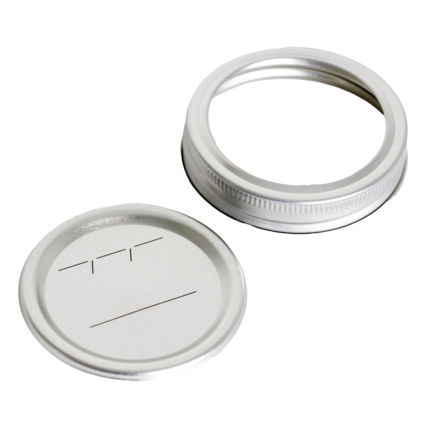 Silver metal regular-mouth canning lid with BPA-free sealing compound and matching band featuring simple black labeling lines, suited for Kitchen & Food, Food Preservation, and Canning collections.