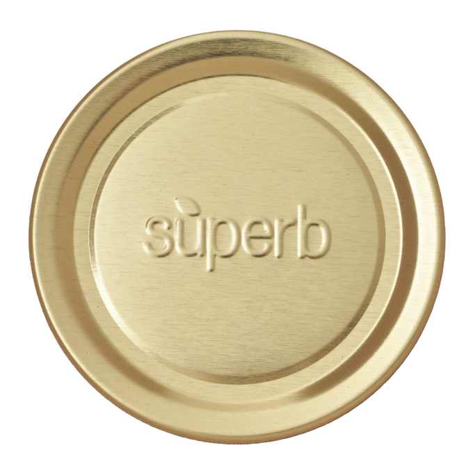 Gold-tone metal regular-mouth canning jar lid embossed with "superb," designed for durable sealing in kitchen and food preservation collections, made in USA.