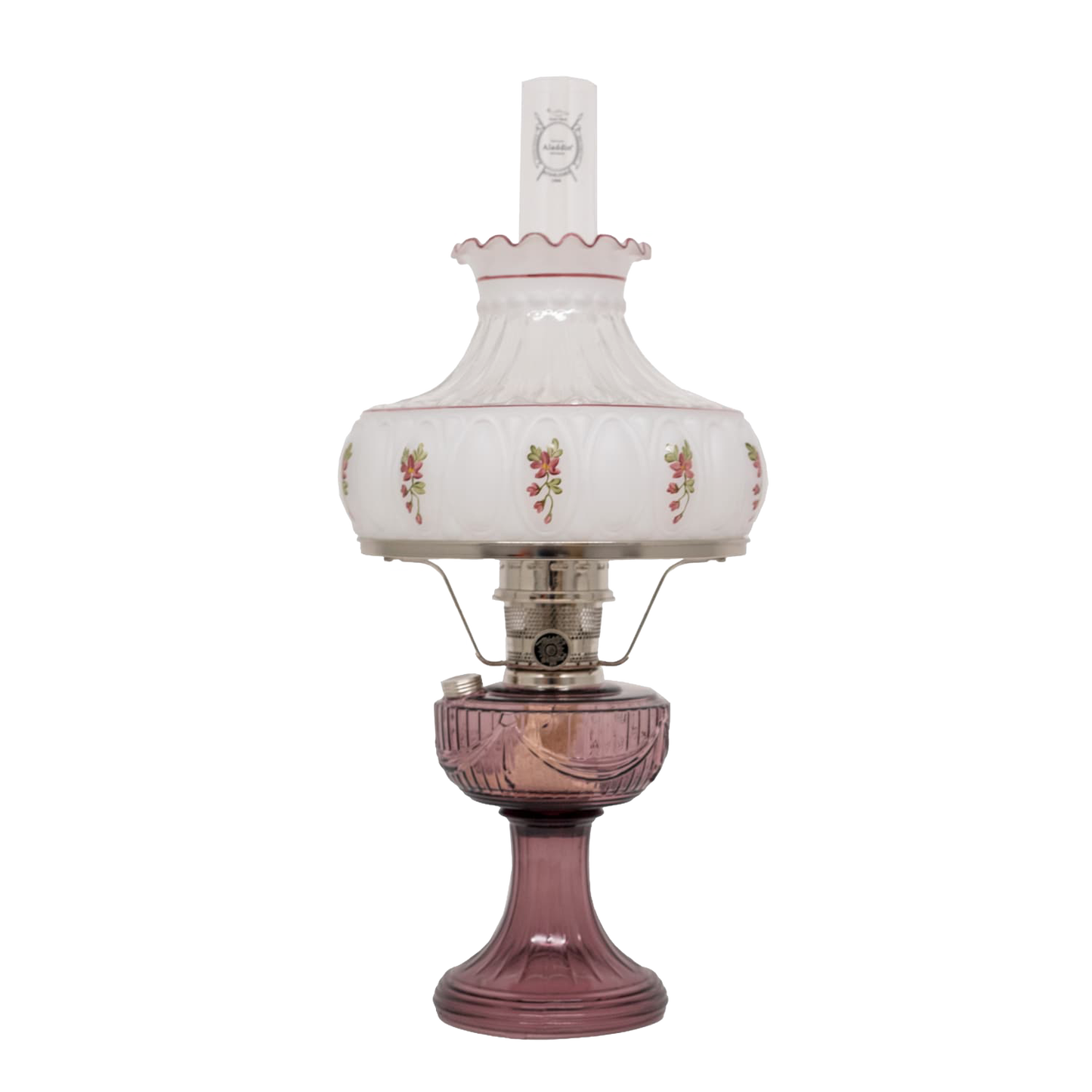 Handcrafted oil lamp with a rose-tinted Lincoln Drape glass base, decorative white font with delicate rose motifs, clear chimney with embossed logo, and polished brass burner, perfect for Farm, Garden & Tool, Lamps & Lighting, Oil Lamps, Table Lamps, Best Sellers, Homesteading, and Promo Eligible collections.