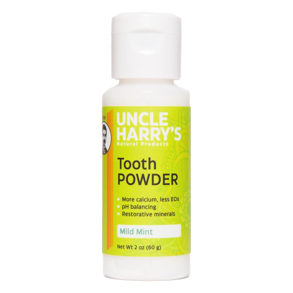 2 oz white plastic bottle of natural tooth powder with bright green label featuring mild mint flavor, pH balancing, restorative minerals, made in USA, ideal for Health & Wellness and Grooming collections.