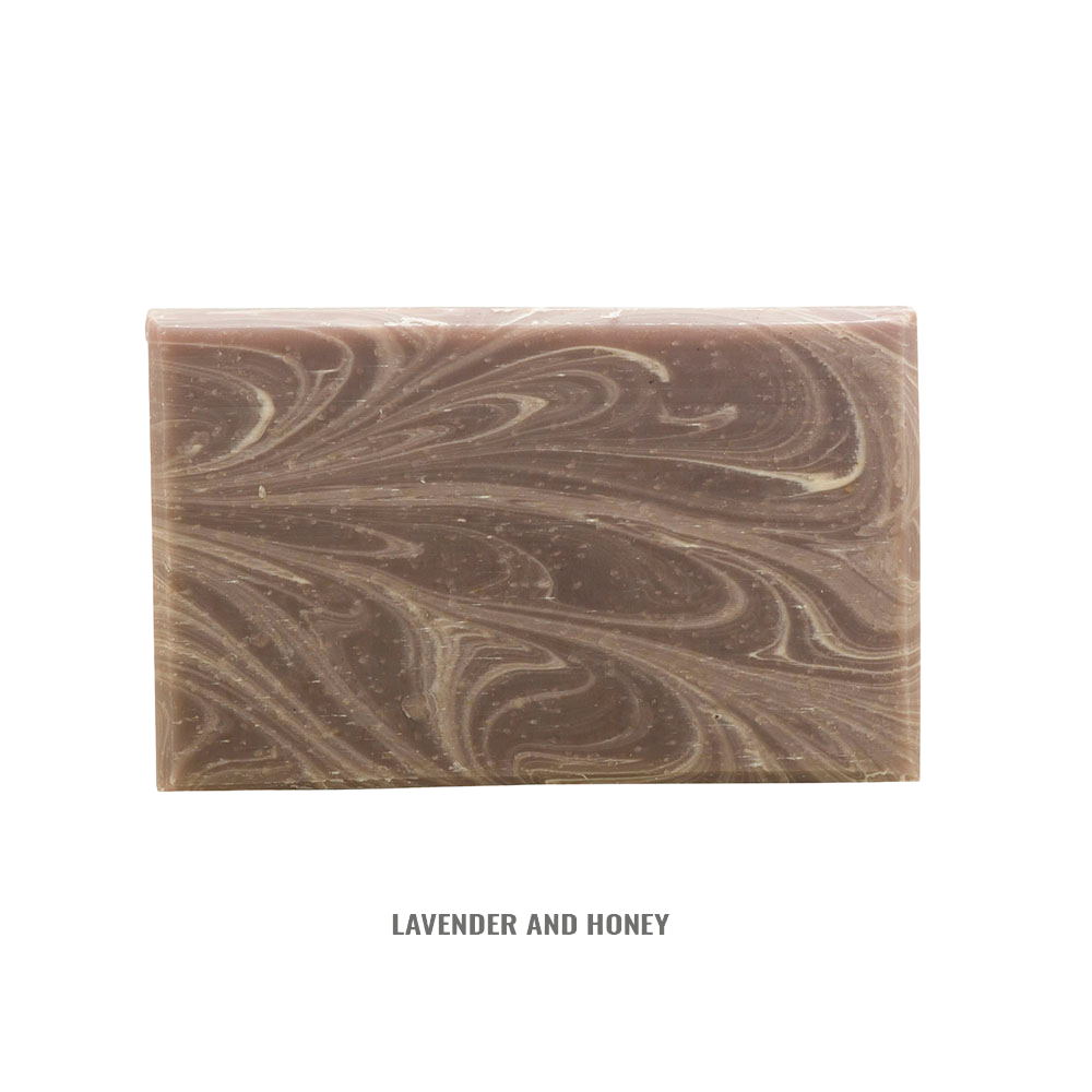Handcrafted rectangular soap bar with swirling lavender and honey tones, made in small batches in the USA, featured in Health & Wellness, Grooming and Personal Hygiene, Soaps collections.