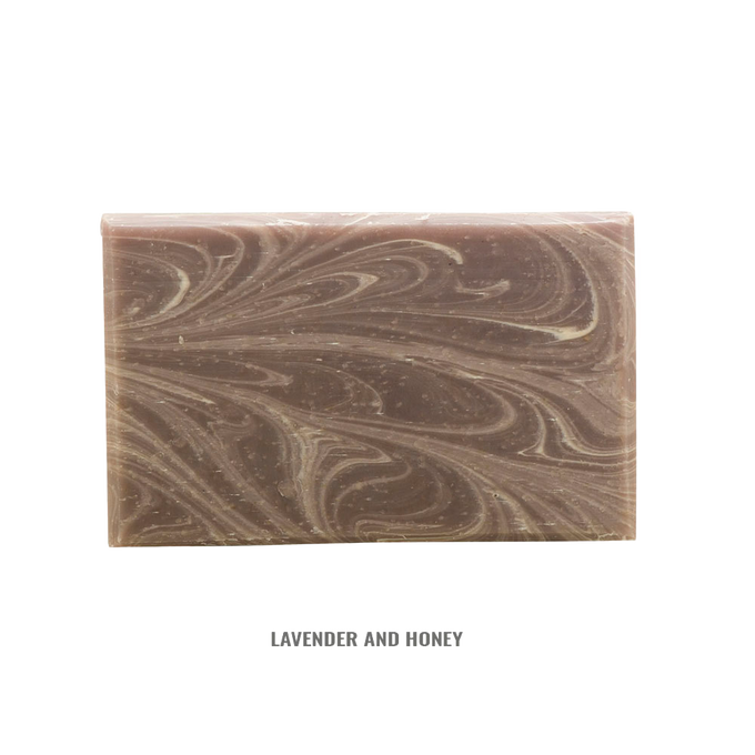 Handcrafted rectangular soap bar with swirling lavender and honey tones, made in small batches in the USA, featured in Health & Wellness, Grooming and Personal Hygiene, Soaps collections.