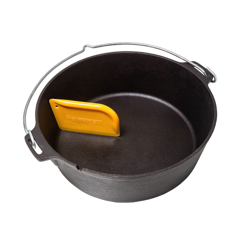 Yellow pan scraper tool resting inside a black cast iron Dutch oven, designed for easy cleaning of cookware, featured in Kitchen & Food, Cookware, Cast Iron, and Best Sellers collections.