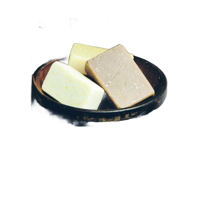 Three handmade soap bars in varying natural colors arranged in a rustic wooden bowl, evoking a simple and wholesome approach to soapmaking for Health & Wellness and Home and Garden How-To Books collections.