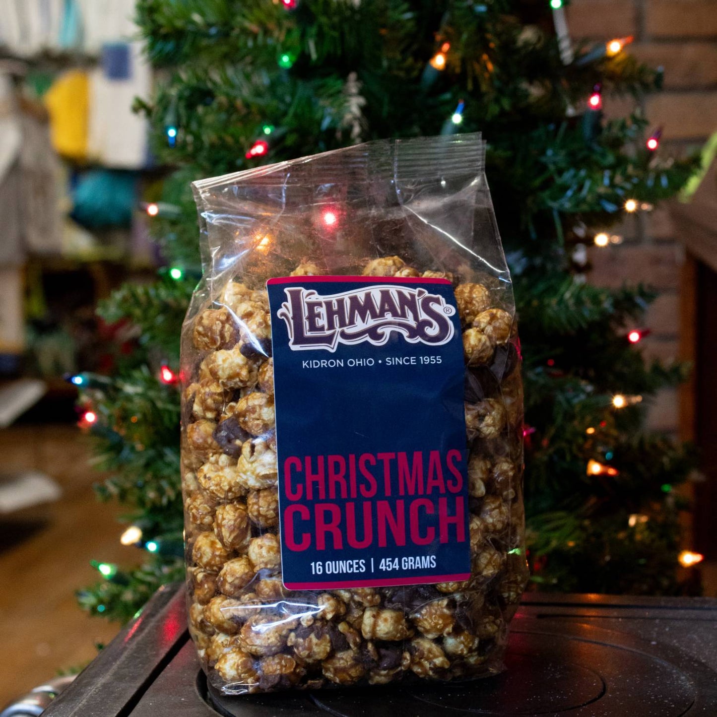 Clear bag of handcrafted caramel popcorn blended with milk chocolate, peppermint, and festive cookie pieces, ideal for Kitchen & Food, Snacks and Sweets, Popcorn, and Best Sellers collections.