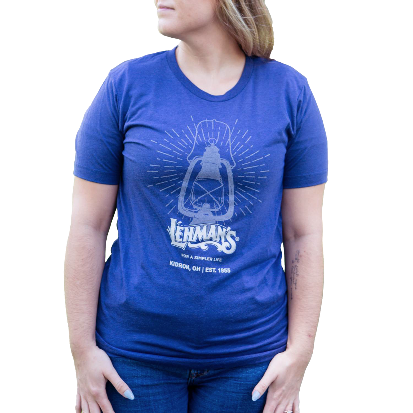 Soft blue handcrafted t-shirt featuring a vintage lantern graphic and "For a Simpler Life" slogan, ideal for Health & Wellness, Emergency Supplies, and Clothing collections.