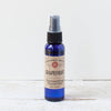 Blue glass spray bottle of handcrafted grapefruit facial mist with natural ingredients, featured in Health & Wellness, Grooming and Personal Hygiene, USA Made, Best Sellers, and Promo Eligible collections.