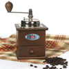 Handcrafted wooden coffee grinder with a polished metal top and extended crank handle, shown with coffee beans on a plaid cloth, ideal for Farm, Garden & Tool and Brewing Coffee and Tea collections.