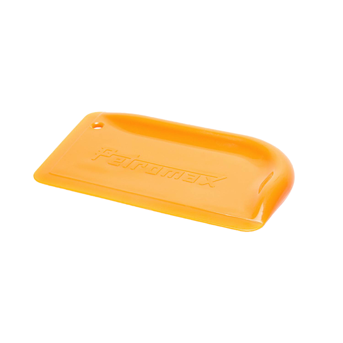 Bright orange Petromax pan scraper with ergonomic curved edges for safely removing residue from cast iron cookware, featured in Kitchen & Food, Cookware, Cast Iron, and Best Sellers collections.