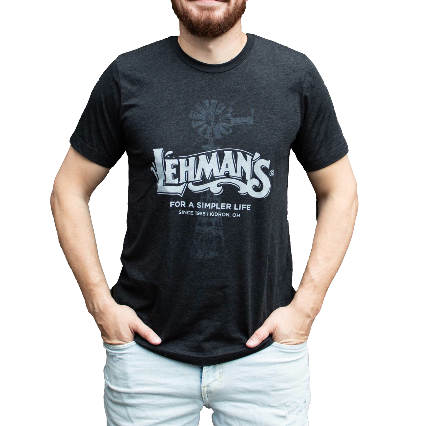 Man wearing a soft, lightweight black t-shirt with a vintage-style windmill graphic and "Lehman's For a Simpler Life" print, ideal for Health & Wellness and Best Sellers collections