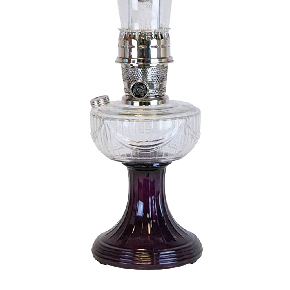 Vintage-style oil lamp with a clear glass font over an amethyst pedestal base, featuring a handcrafted design, ideal for Lamps & Lighting and Best Sellers collections.