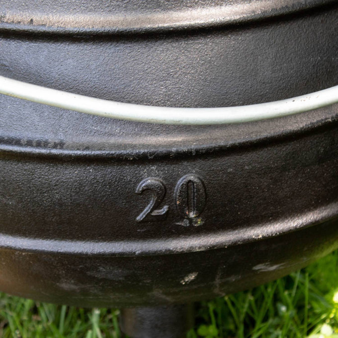 Close-up of the round cast iron campfire kettle embossed with the number 20, featuring handcrafted durable construction ideal for Farm, Garden & Tool, Camping, Best Sellers, and Promo Eligible collections.