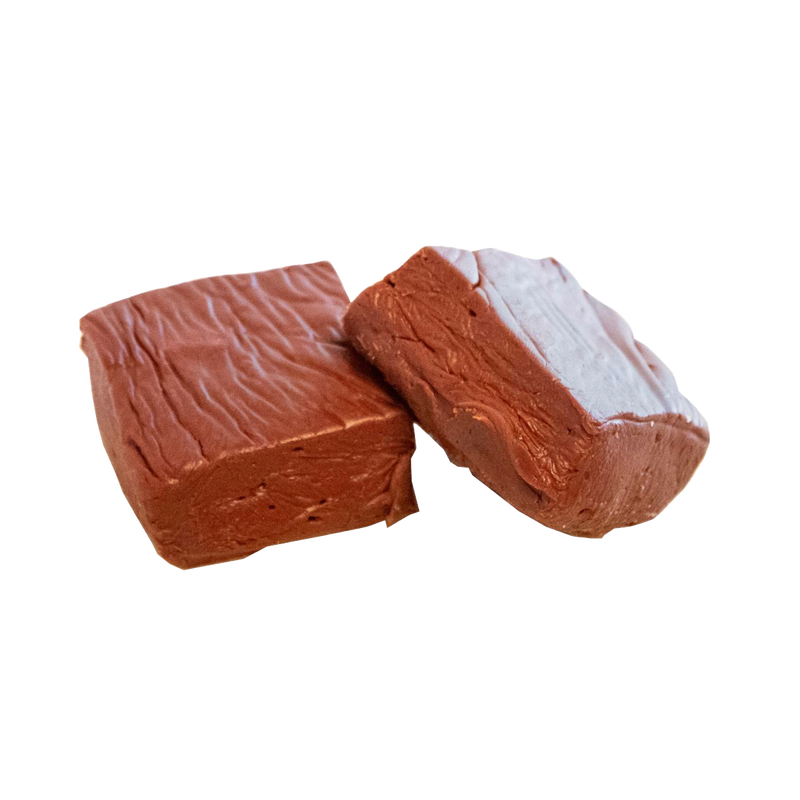 Two pieces of handcrafted creamy chocolate fudge with a smooth, rich texture, featured in Kitchen & Food, Snacks and Sweets, USA Made, Best Sellers, and Promo Eligible collections.