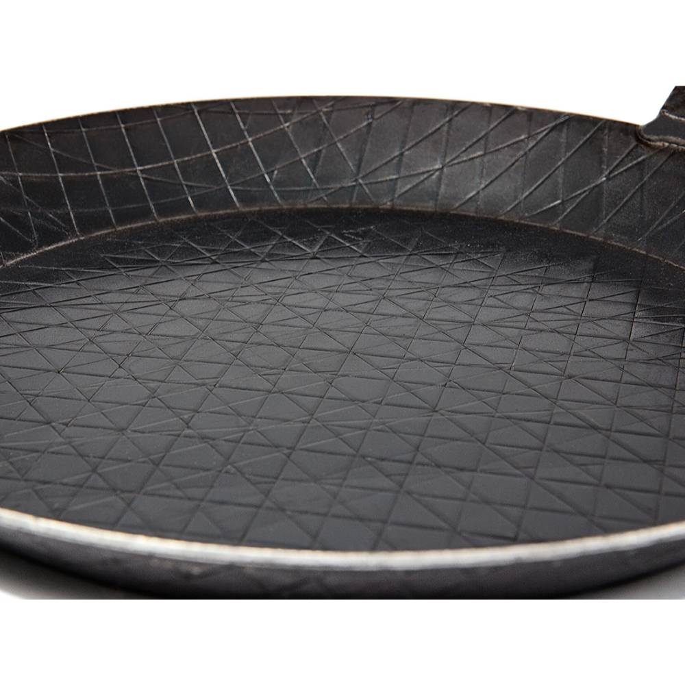Handcrafted wrought iron pan featuring a textured crosshatch cooking surface, designed for durable outdoor and indoor use, ideal for Farm, Garden & Tool, Kitchen & Food, Camping, Cookware, Pots and Pans, Best Sellers, and Promo Eligible collections.
