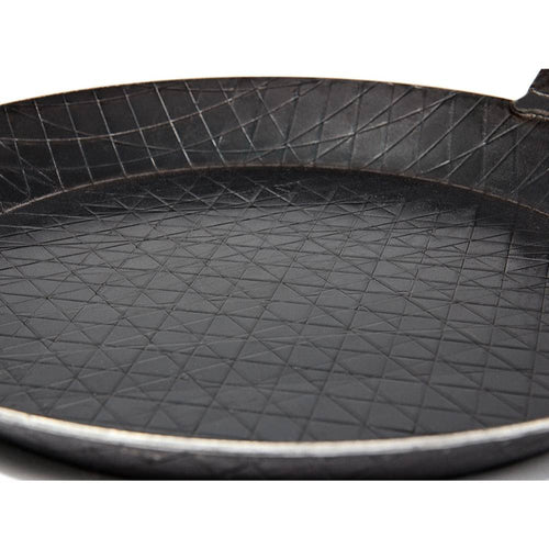 Handcrafted wrought iron pan featuring a textured crosshatch cooking surface, designed for durable outdoor and indoor use, ideal for Farm, Garden & Tool, Kitchen & Food, Camping, Cookware, Pots and Pans, Best Sellers, and Promo Eligible collections.