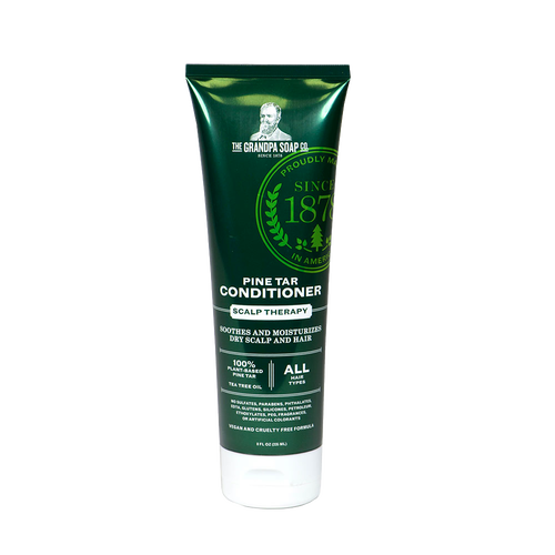 Dark green tube of handcrafted conditioner featuring pine tar and tea tree oil, made in USA to soothe and moisturize dry scalp and hair, ideal for all hair types in Health & Wellness and Shampoo and Conditioner collections.