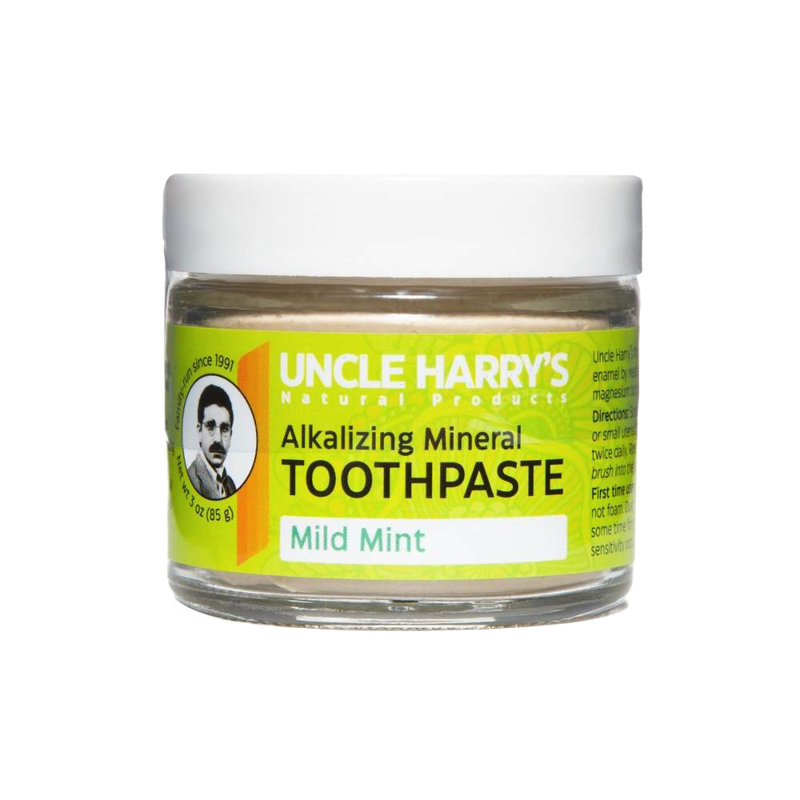 Handcrafted glass jar of Uncle Harry’s all-natural alkalizing mineral toothpaste in mild mint flavor with white lid and bright yellow-green label, ideal for Health & Wellness, Grooming and Personal Hygiene, USA Made, Best Sellers, and Promo Eligible collections.