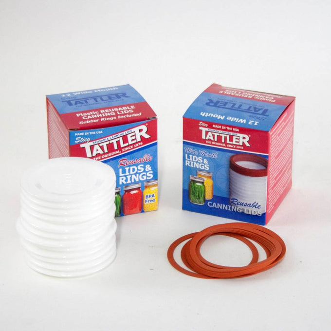 Two stacked sets of translucent wide-mouth reusable plastic canning lids paired with orange rubber sealing rings, alongside two Tattler brand red and blue packaging boxes, ideal for Kitchen & Food, Food Preservation, Canning, USA Made, and Best Sellers collections.