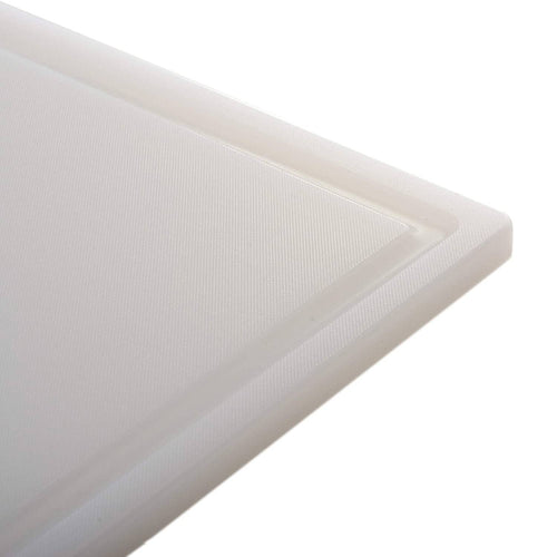 Close-up of a durable high-density plastic cutting board with a grooved edge to catch juices, designed for efficient food prep, featured in Kitchen & Food and Best Sellers collections.