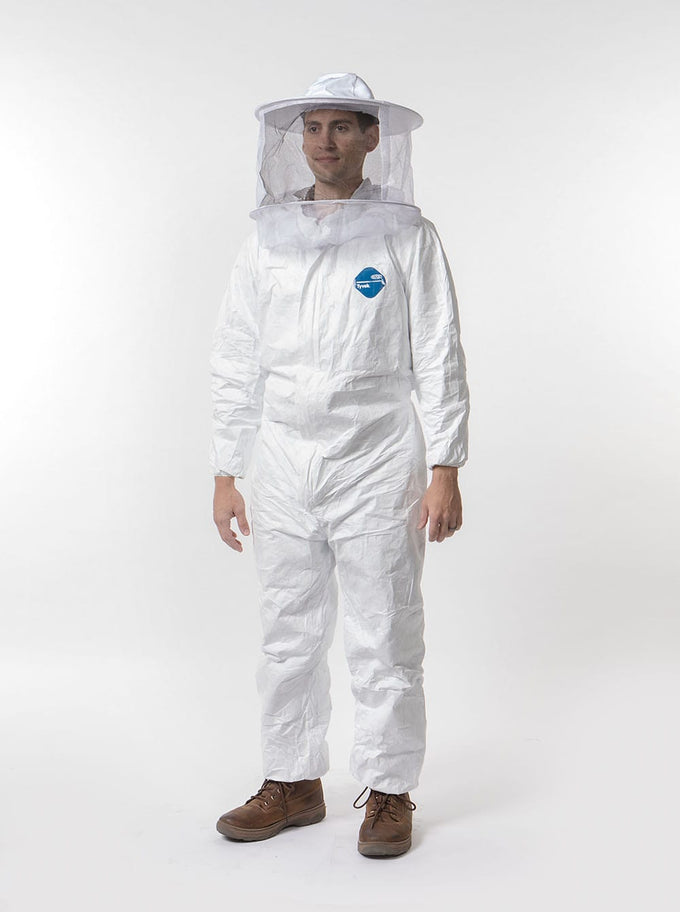 Man wearing white water-resistant Tyvek beekeeping coveralls with elastic cuffs and ankles, paired with separate wide-brim hat and protective veil, featured in Farm, Garden & Tool, Beekeeping Supplies, and Best Sellers collections.